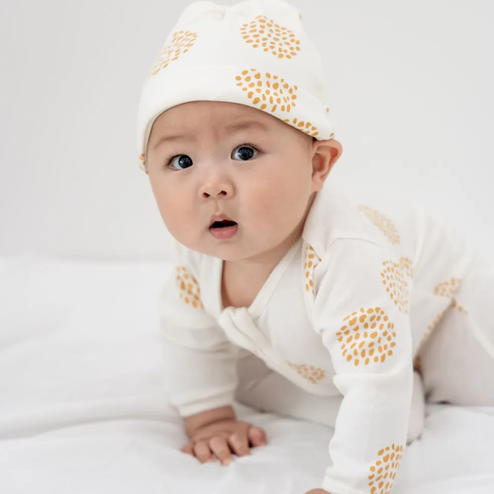Motherswork x Le Petit Society Baby Organic Knotted Hat in Dandelion Print
